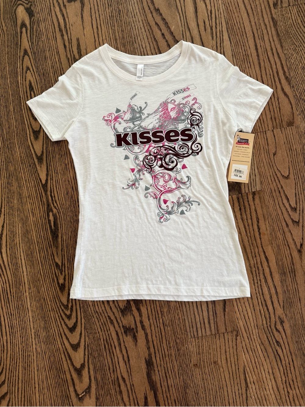 Next Level Apparel Hershey’s White Tee with Pink & Black Kisses Graphic